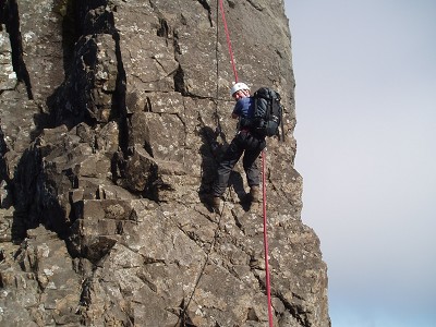 A client abseiling